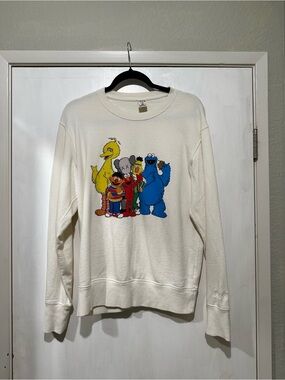 KAWS White Crewneck Sweatshirt with Colorful Cartoon Group Graphic
